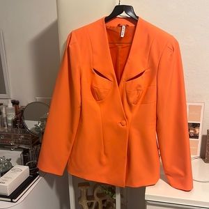 Brand new without tags , NEVER WORN, beautiful orange blazer.